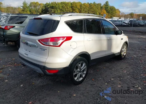 2015 Ford Escape Titanium z USA, uszkodzony, nr VIN 1FMCU9J94FUB17662